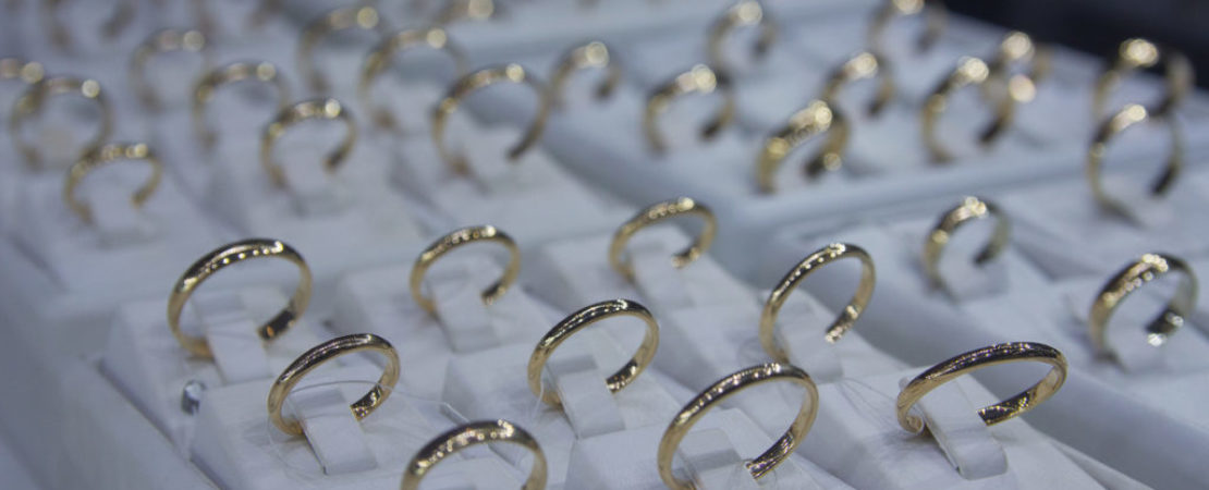 Gold rings on the counter of the store. Jewelry